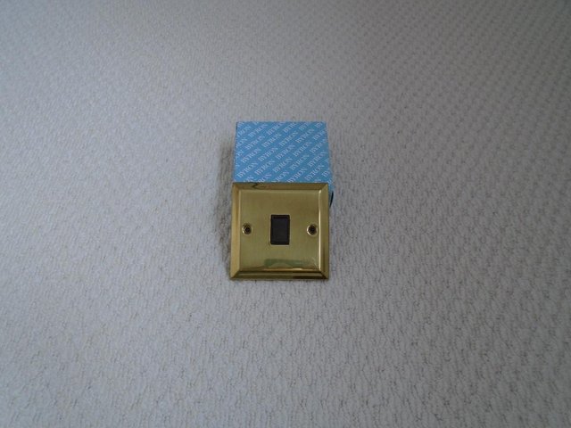 Preview of the first image of Byron Brass Light Switch with Smooth Edges.