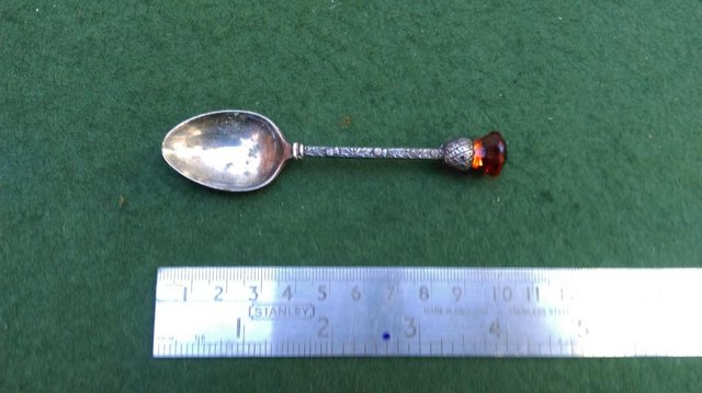 Preview of the first image of Fine Scottish Silver Plated tea spoon very ornate detail.