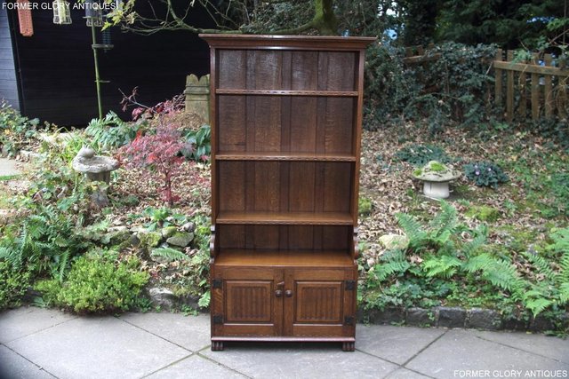 Preview of the first image of A NIGEL RUPERT GRIFFITHS OAK BOOKCASE CD DVD SHELVES CABINET.