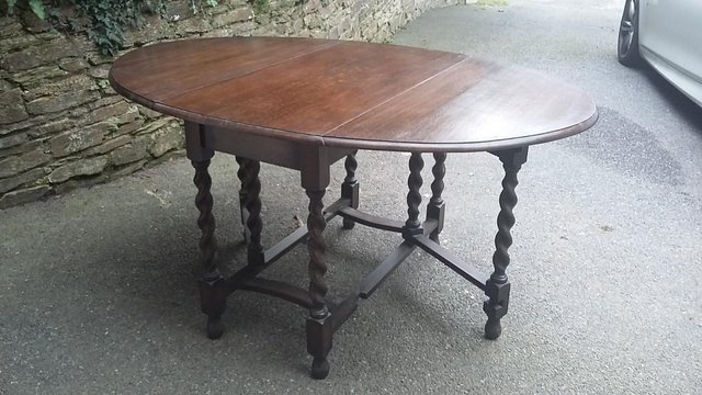 Preview of the first image of Antique Solid Oak Oval Drop Leaf Gateleg Dining Table.