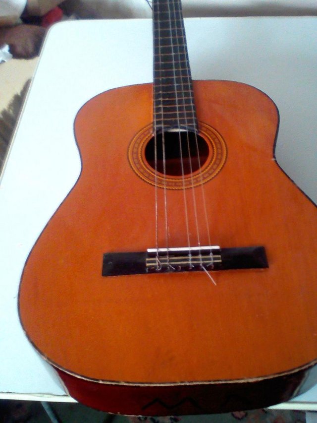 Preview of the first image of Prince quality Acustic Guitar ,only got 5 strings.