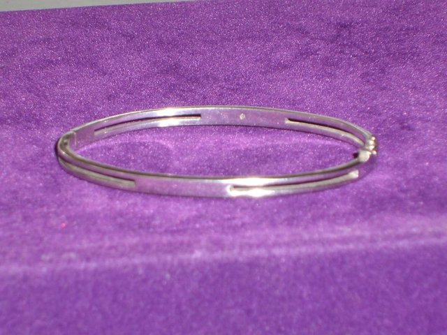 Preview of the first image of 925 Sterling Silver Hinged Bracelet With Stone.
