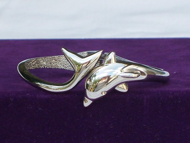 Preview of the first image of Silver Toned Dolphin Bracelet NEW!.