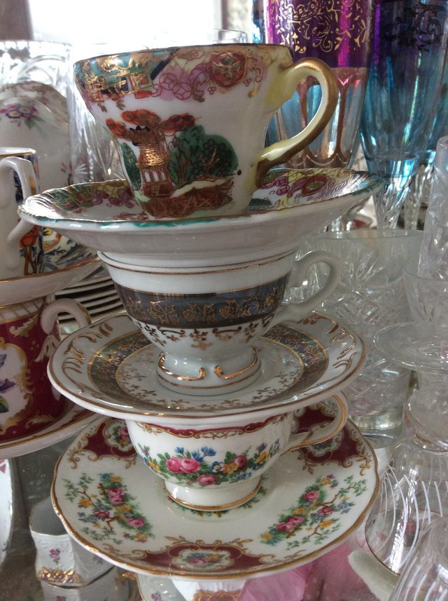 Preview of the first image of Three very pretty small China cups and saucers.