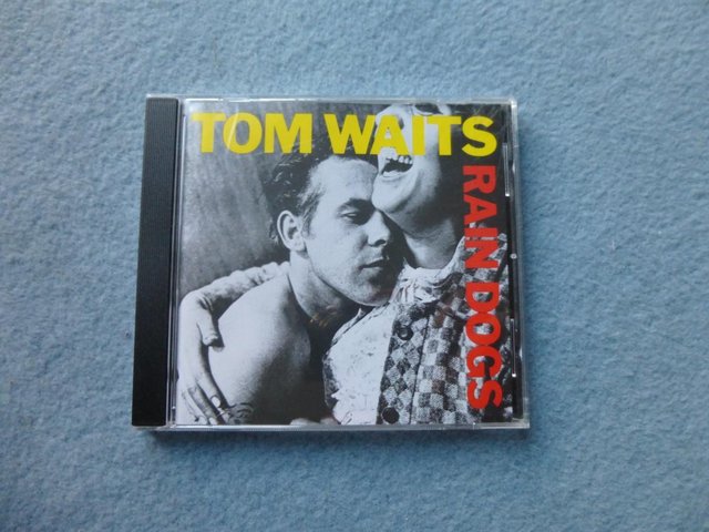 Preview of the first image of Tom Waits "Rain Dogs" music CD.