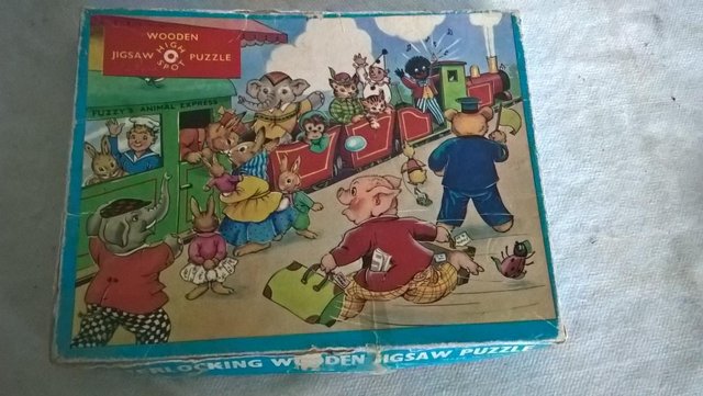 Preview of the first image of Vintage Wooden Jigsaw High Spot Puzzle - Fuzzy The Fireman.