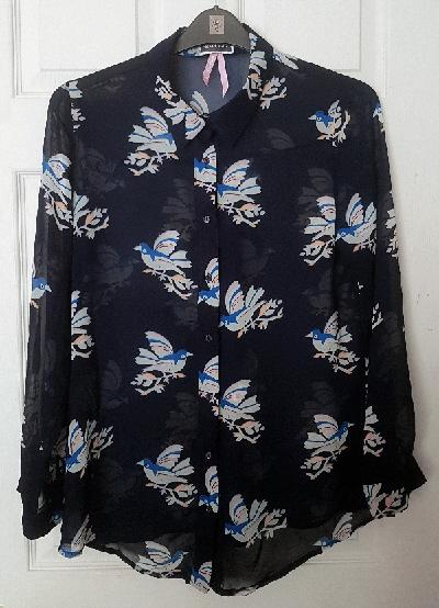 Preview of the first image of Navy Blouse With Bird Print Design By Red Chilli - Size 14.