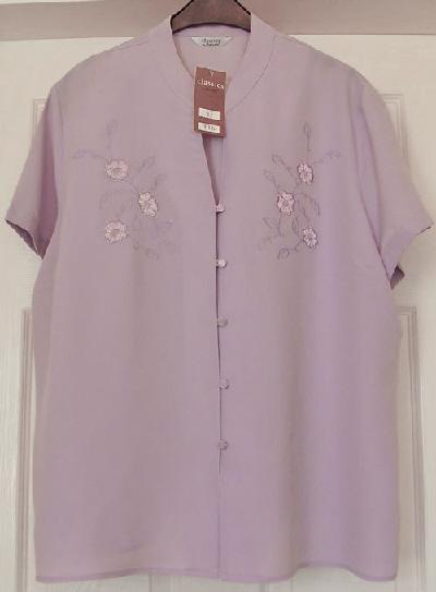Preview of the first image of BNWT SHORT SLEEVE LILAC BLOUSE BY BERKERTEX - SZ 22 B1.