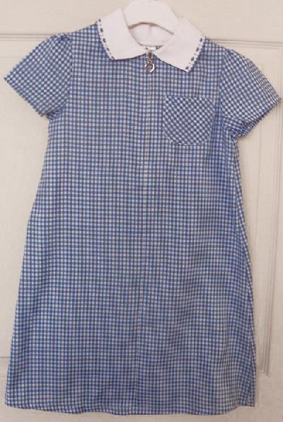 Preview of the first image of GIRLS BLUE CHECK SUMMER DRESS - AGE 6/7 YRS.