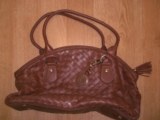 Preview of the first image of Brown Anne Klein Leather Handbag.