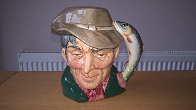 Preview of the first image of Royal Doulton "The Poacher" small toby jug 4" high D6464.