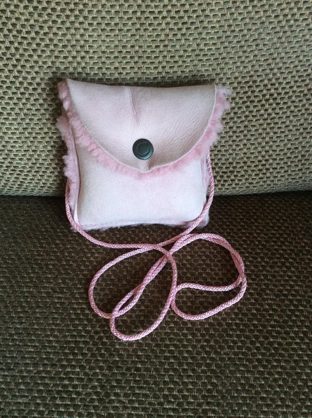 Preview of the first image of Celtic Sheepskin Co sheepskin purse.