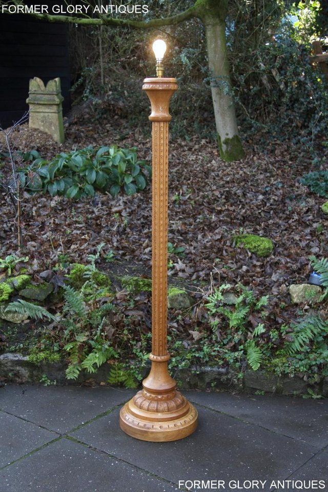 Preview of the first image of NIGEL RUPERT GRIFFITHS SOLID CARVED OAK STANDARD CHAIR LAMP.