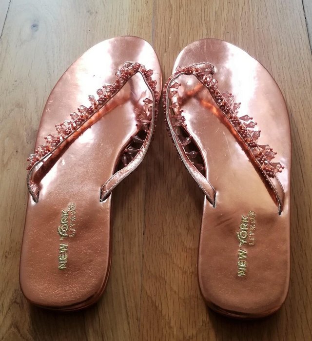 Preview of the first image of DESIGNER NEW YORK LITES Flip Flops Beaded Copper Sandals.