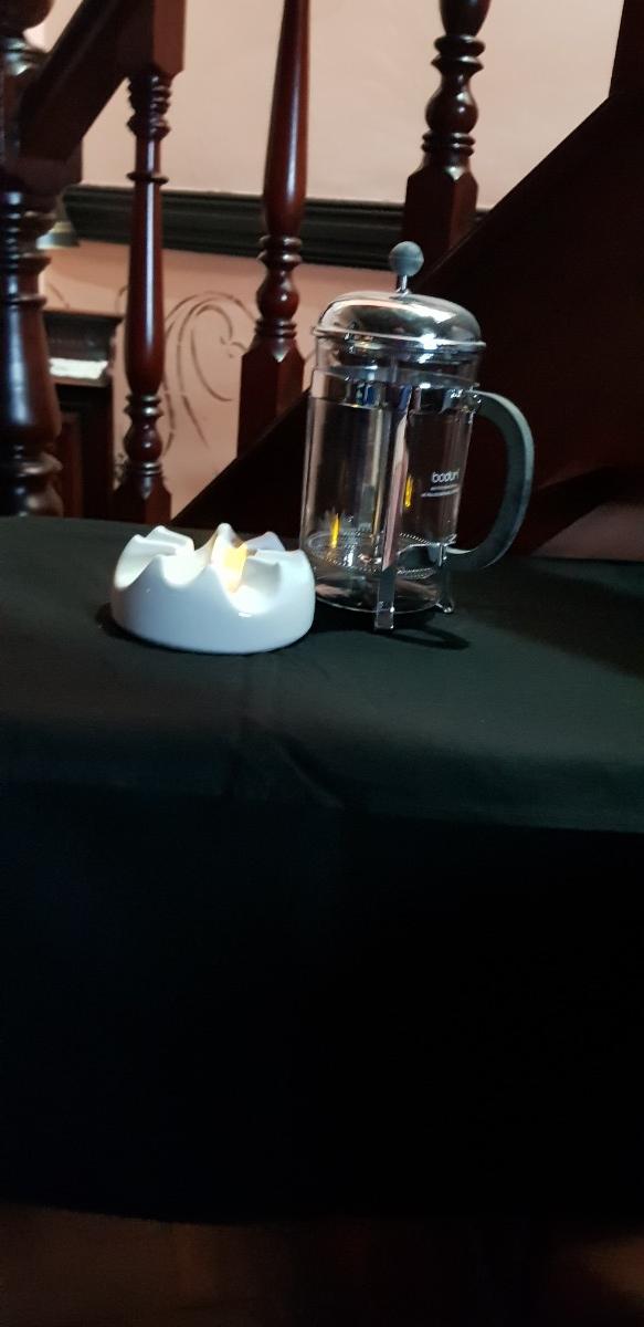Preview of the first image of 12 cup Cafetiere with table warmer.