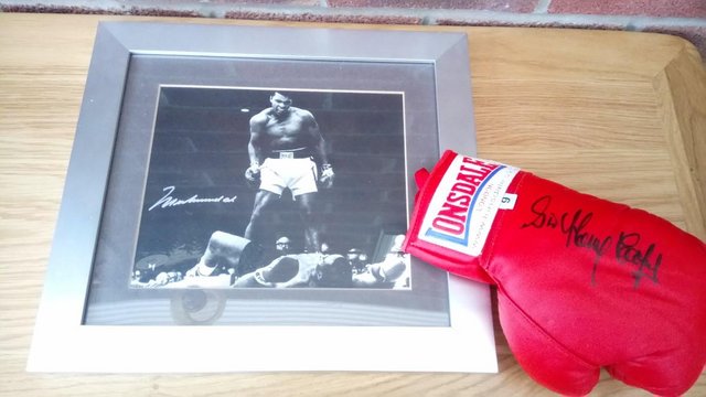 Preview of the first image of Muhammad Ali Signed Picture and Henry Cooper Signed Glove.