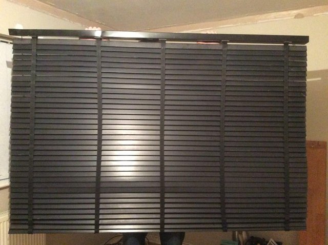 Preview of the first image of Faux wood venetian black blind.