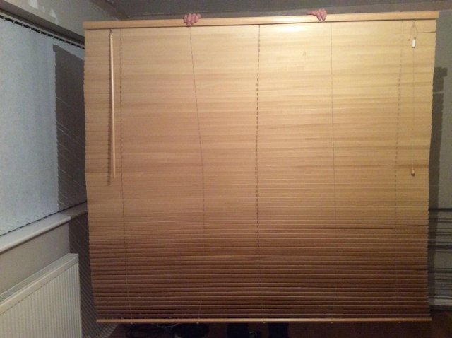 Preview of the first image of Faux wood venetian pine / oak blind.