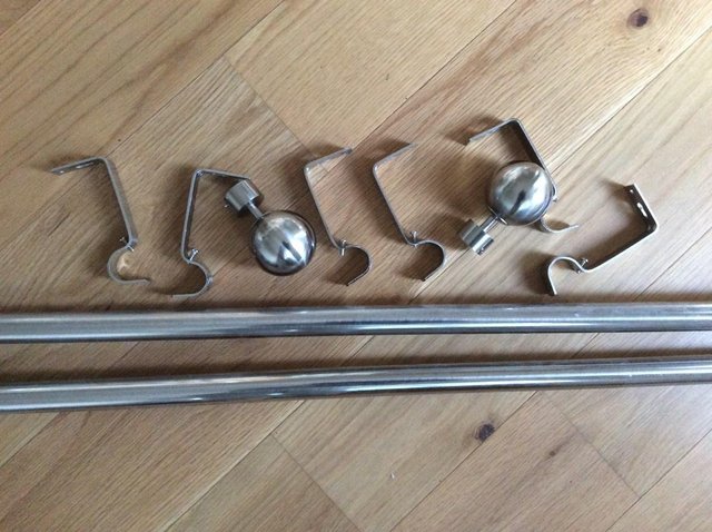 Image 2 of Expandable metal pole with brackets and ends