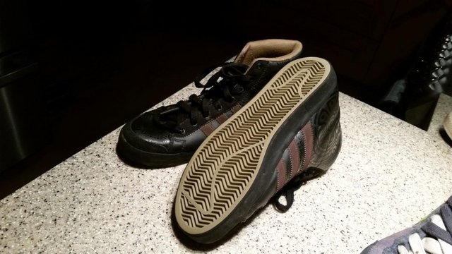 Preview of the first image of Adidas Size 6.5 leather ankle boot.