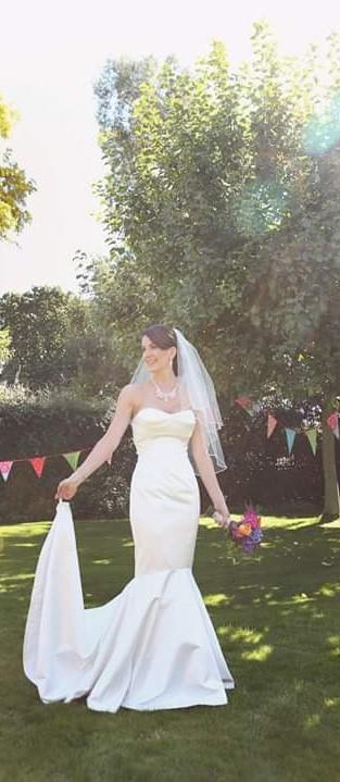 Preview of the first image of Beautiful Caroline Castigliano Wedding Dress Size 8.