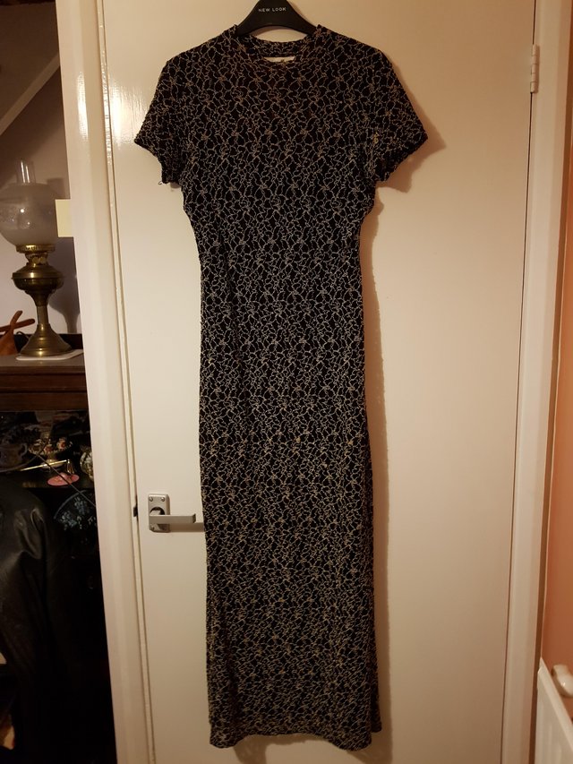 Preview of the first image of Black and Gold Maxi Dress - Wallis.