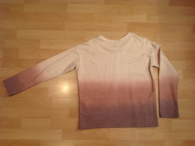 Preview of the first image of Zara long sleeve top, size M.
