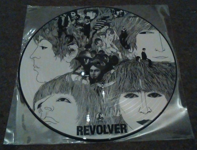 Preview of the first image of BEATLES REVOLVER RARE 12" VINYL PICTURE DISC.