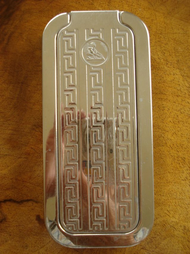 Preview of the first image of ANTIQUE VINTAGE ROLLS RAZOR 2-LID TIN WITH 5 RAZOR BLADES.