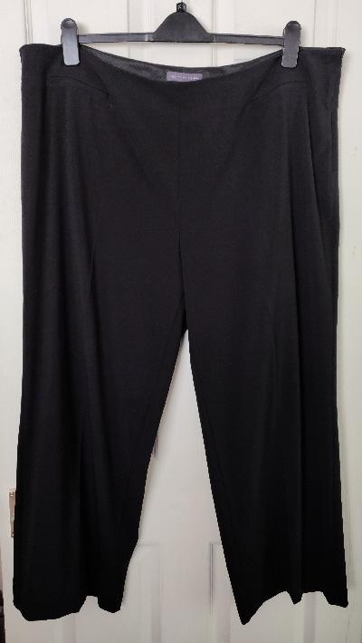 Preview of the first image of Smart Ladies Black Trousers By The M&S Collection - Size 24.