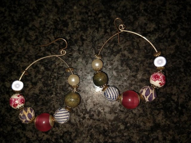 Preview of the first image of Pair beaded hoop earrings..