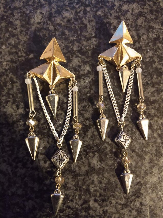 Preview of the first image of Modern long dangle earrings.