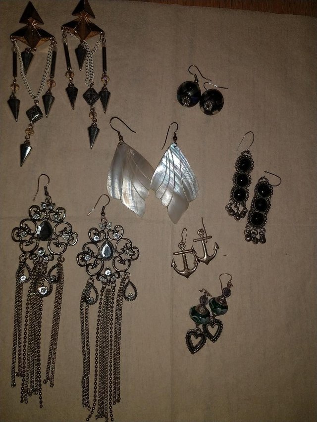 Preview of the first image of 7 beautiful pairs of dangle earrings..