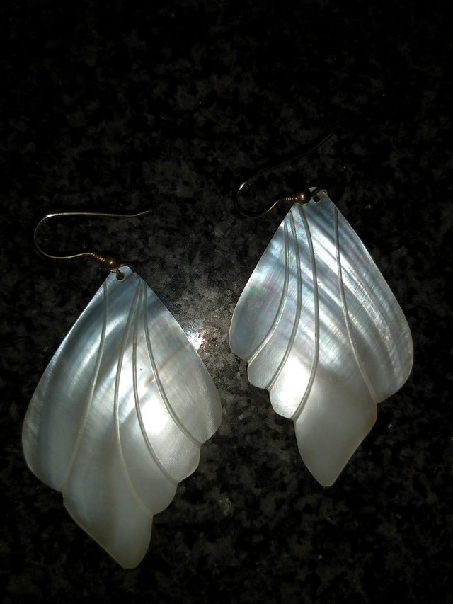 Image 7 of 7 beautiful pairs of dangle earrings.