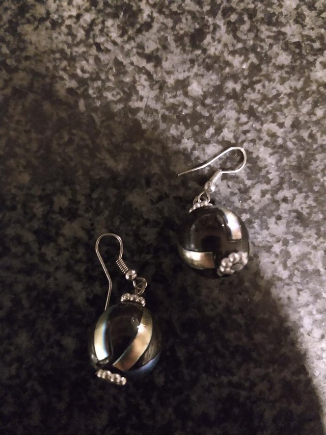 Image 8 of 7 beautiful pairs of dangle earrings.