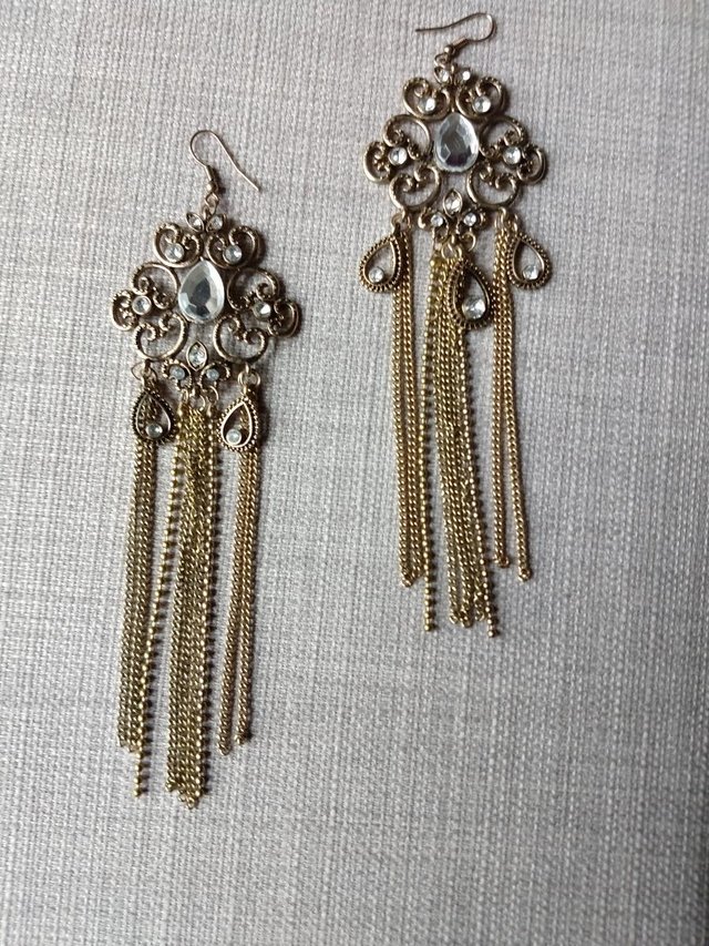 Preview of the first image of Long dangle chain earrings.