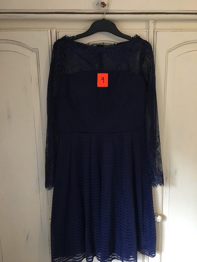 Preview of the first image of Dorothy Perkins new with tags navy skater dress. Size 12..