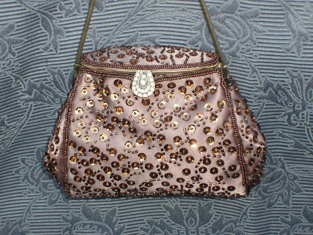 Preview of the first image of NEXT Pink/Bronze Beaded Bag/Clutch.