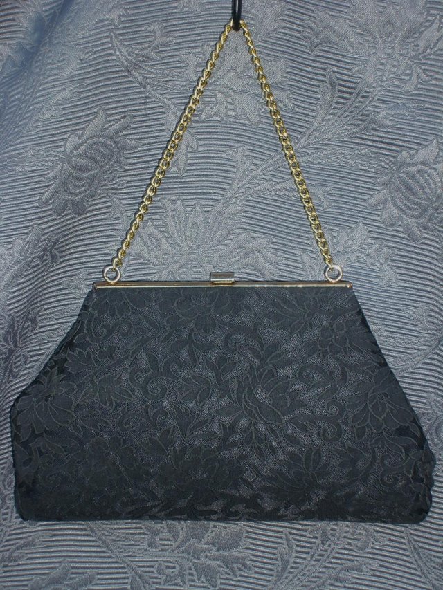 Preview of the first image of Vintage Black Jacquard Wrist Bag.