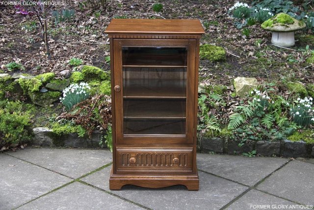 Preview of the first image of ERCOL GOLDEN DAWN HI FI MUSIC CD DISPLAY CABINET TV STAND.