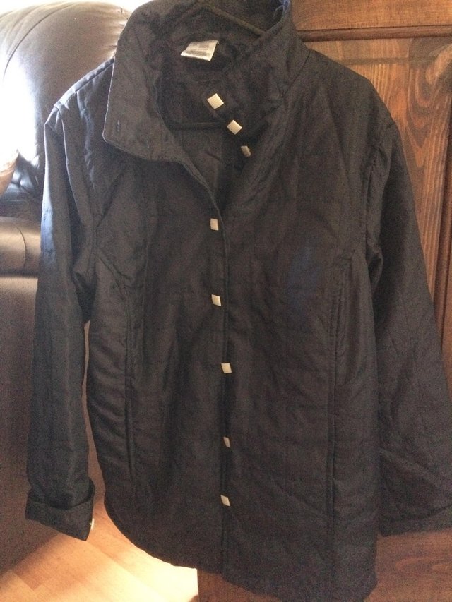 Preview of the first image of Black womens jacket size 10.