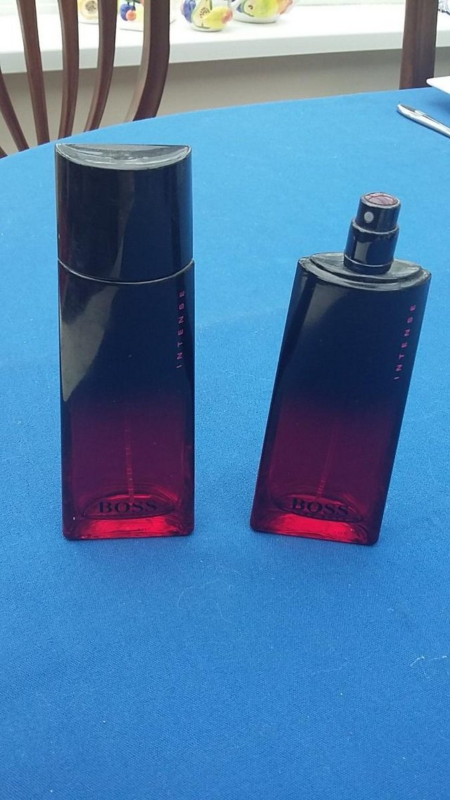 Preview of the first image of 2 Boss Intense Perfume Bottles - empty, one with lid, 50ml.
