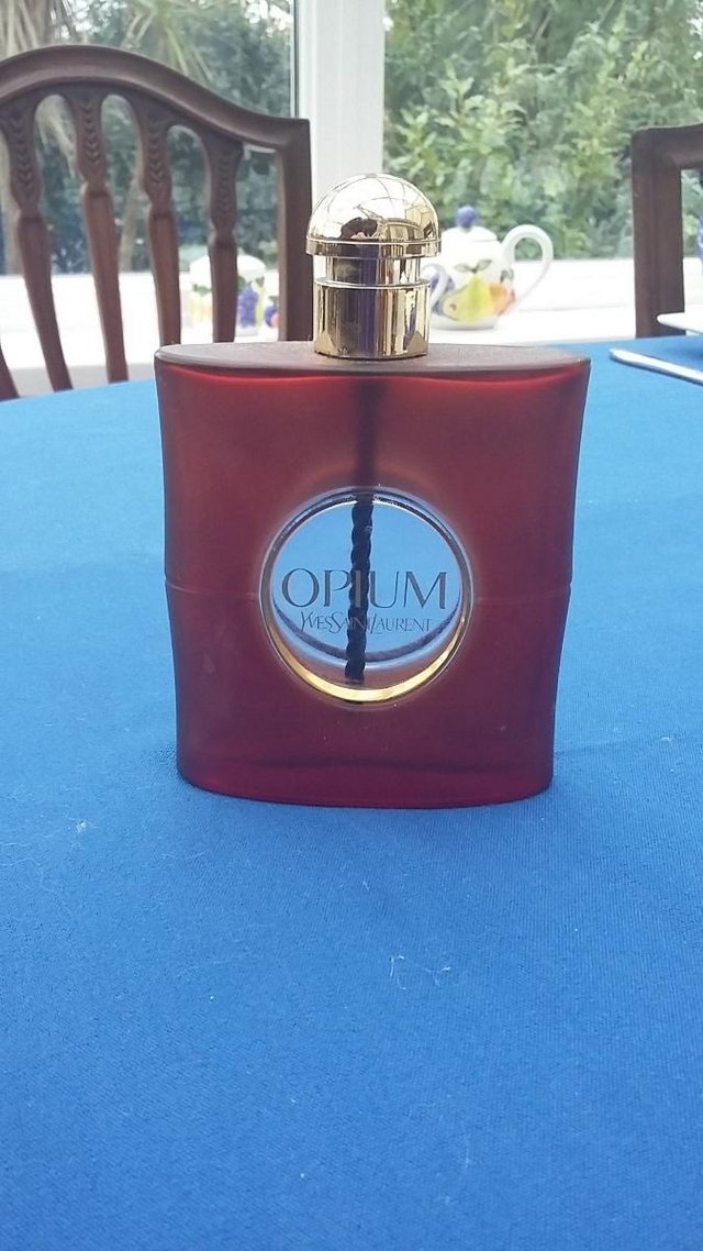 Preview of the first image of Opium 90ml Perfume Bottle - empty, collectors item.