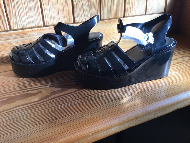 Preview of the first image of BNIB TRUFFLE COLLECTION BLACK WEDGE SANDALS SZ 6.