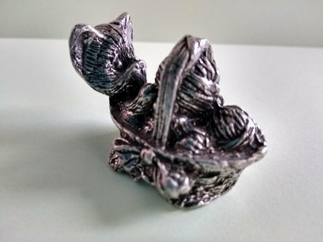 Preview of the first image of Etain 95% pewter cat in basket.