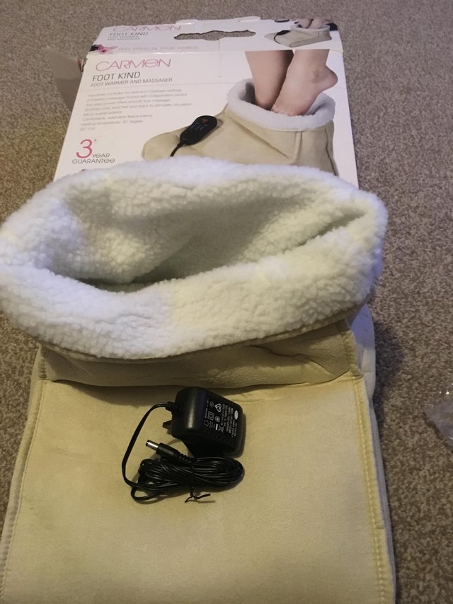 Preview of the first image of CARMEN FOOT KIND  FOOT WARMER MASSAGER.