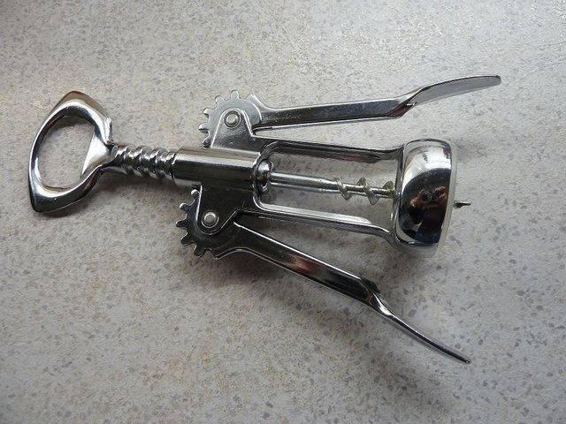 Preview of the first image of Chrome winged corkscrew opener for wine bottles.