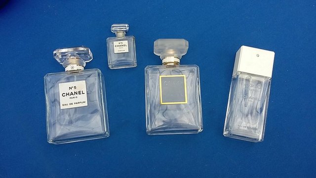 Preview of the first image of Chanel No5 & Coco Mademoiselle Perfume Bottles.