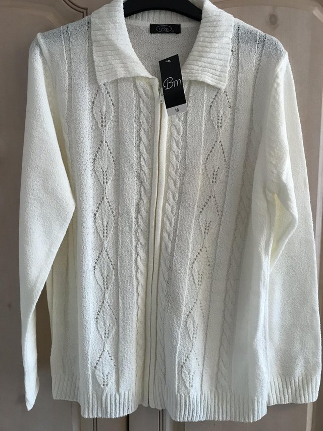 Preview of the first image of Bonmarche, New Medium Cream Zip Cardigan.