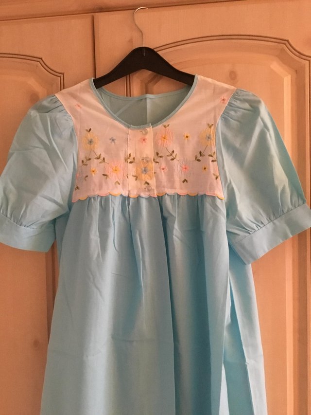 Preview of the first image of Brand New pretty turquoise night dress.